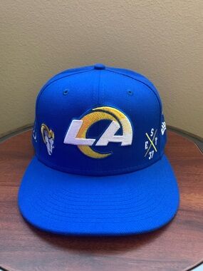 New Era Los Angeles Rams Royal Blue Fitted Hat Size 7 3/4. Good Condition.